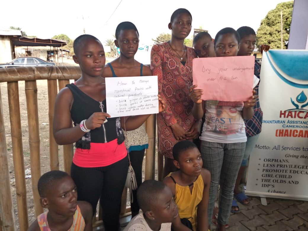 Children attending a HAICAM-supported classroom in Cameroon, receiving free education and school supplies.