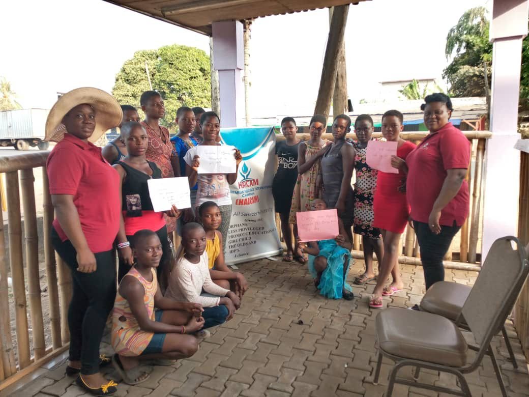 HAICAM staff engaging with children in a safe space, promoting child protection, education, and rights awareness in Cameroon.